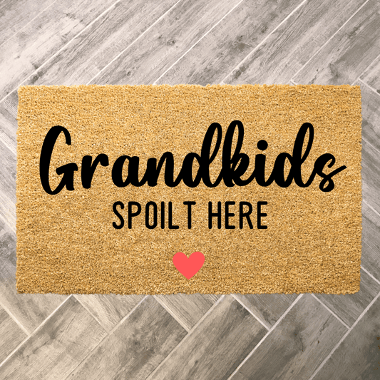 Grandkids Spoilt Here door mat