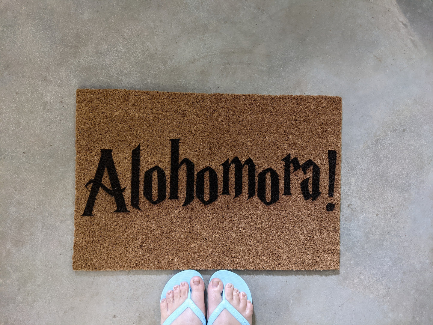 Alohomora front door mat