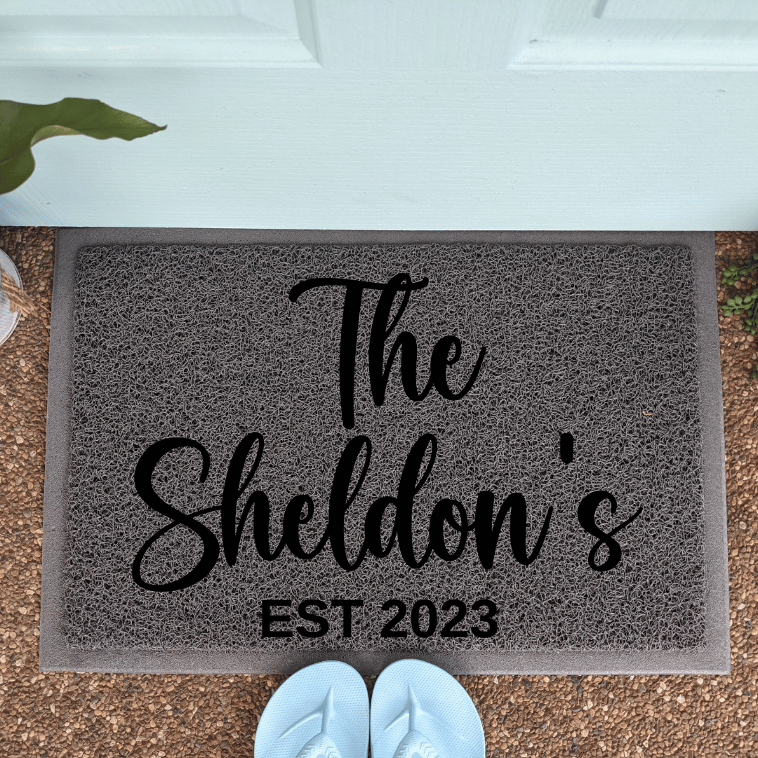 The "name" personalised doormats with est
